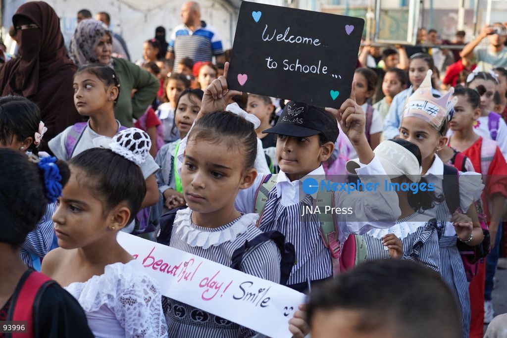NUSEIRAT, GAZA STRIP, SEPTEMBER 19, 2026: Palestinian children return to classrooms at an UNRWA school in Nuseirat refugee camp in the central Gaza Strip as in-person education gradually resumes following years of disruption caused by the war. The return comes as the new academic year begins in Gaza, where widespread destruction, displacement and the use of school buildings as shelters have severely disrupted access to education. Photo by Ramzi Abu Amer / JNA Press. (Photo by Ramzi Abu Amer/JNA Press via Nexpher Images)