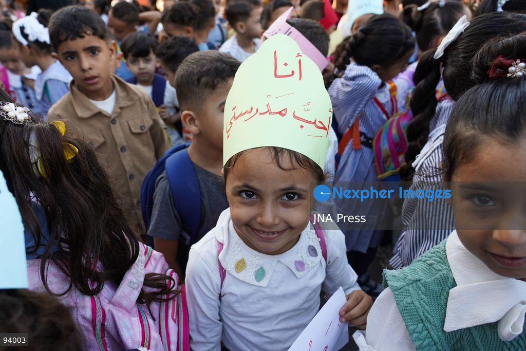 NUSEIRAT, GAZA STRIP, SEPTEMBER 19, 2026: Palestinian children return to classrooms at an UNRWA school in Nuseirat refugee camp in the central Gaza Strip as in-person education gradually resumes following years of disruption caused by the war. The return comes as the new academic year begins in Gaza, where widespread destruction, displacement and the use of school buildings as shelters have severely disrupted access to education. Photo by Ramzi Abu Amer / JNA Press. (Photo by Ramzi Abu Amer/JNA Press via Nexpher Images)