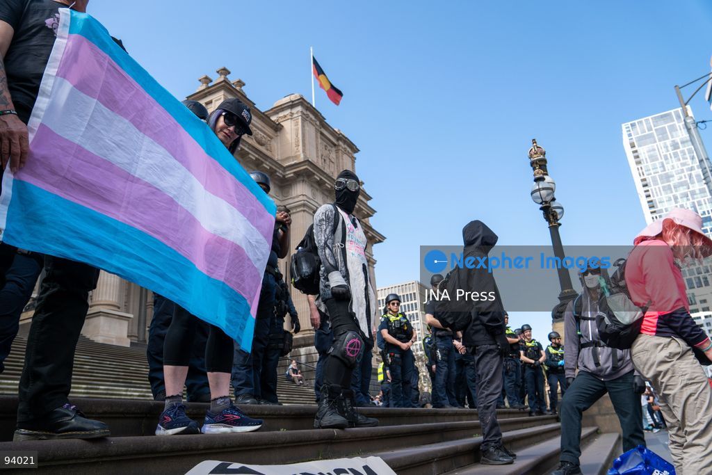 MELBOURNE, AUSTRALIA, SEPTEMBER 19, 2026: Transgender rights supporters demonstrate outside the Parliament of Victoria in Melbourne amid a heavy police presence. Tensions rise as protesters confront bodyguards accompanying Avi Yemini while he attempts to interview people opposing the demonstration. Photo by Braden Nam / JNA Press. (Photo by Taemin Braden Nam/JNA Press via Nexpher Images)
