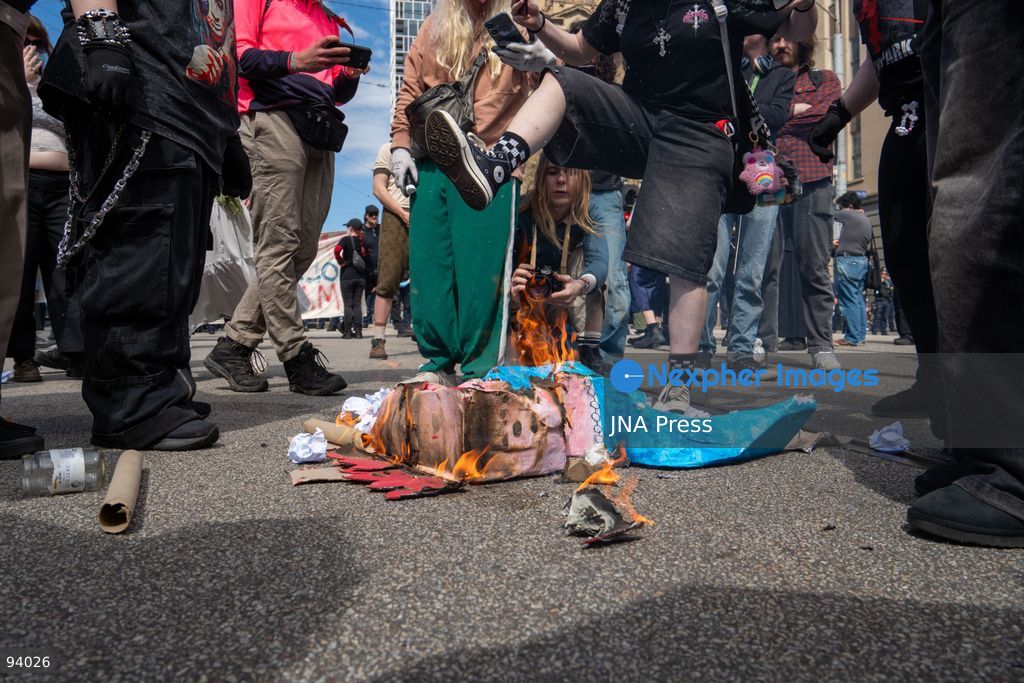 MELBOURNE, AUSTRALIA, SEPTEMBER 19, 2026: Transgender rights supporters demonstrate outside the Parliament of Victoria in Melbourne amid a heavy police presence. Tensions rise as protesters confront bodyguards accompanying Avi Yemini while he attempts to interview people opposing the demonstration. Photo by Braden Nam / JNA Press. (Photo by Taemin Braden Nam/JNA Press via Nexpher Images)
