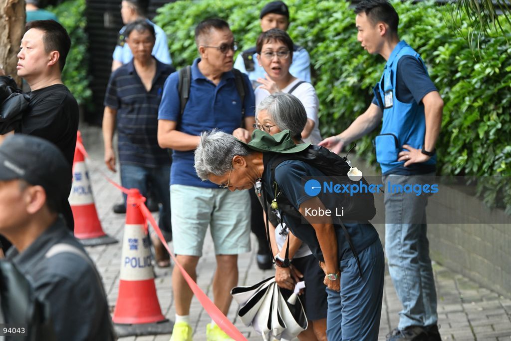 People bowing outside of the Hong Kong Funeral Home in North Point on September 19, 2026 in Hong Kong. Today, the public memorial ceremony for Hong Kong's first Chief Executive, Tung Chee-hwa at the Hong Kong Funeral Home in North Point. (Photo by Kobe Li/Nexpher Images)
