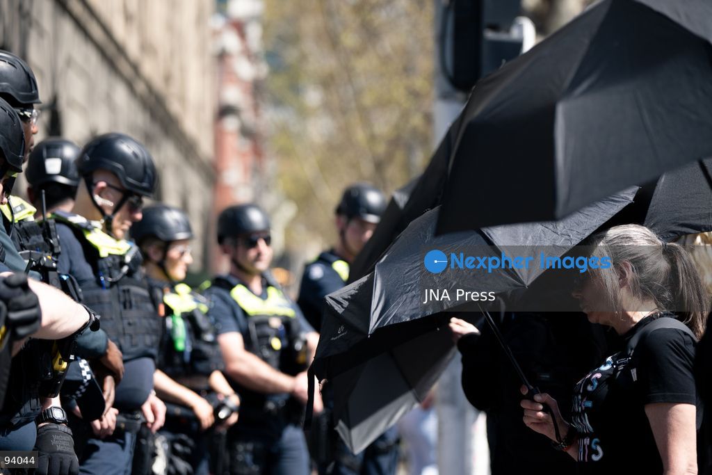 MELBOURNE, AUSTRALIA, SEPTEMBER 19, 2026: Police separate opposing groups during demonstrations outside the Parliament of Victoria in Melbourne, where a group describing itself as a women’s rights movement gathered to oppose legal protections for transgender people and was met by transgender rights counter-protesters. Tensions escalated when Avi Yemini of the right-wing outlet Rebel News approached the counter-protest and became involved in a confrontation with demonstrators before police intervened and separated those involved. Photo by Gwendolyn Dilon / JNA Press. (Photo by Gwendolyn Dillon/JNA Press via Nexpher Images)