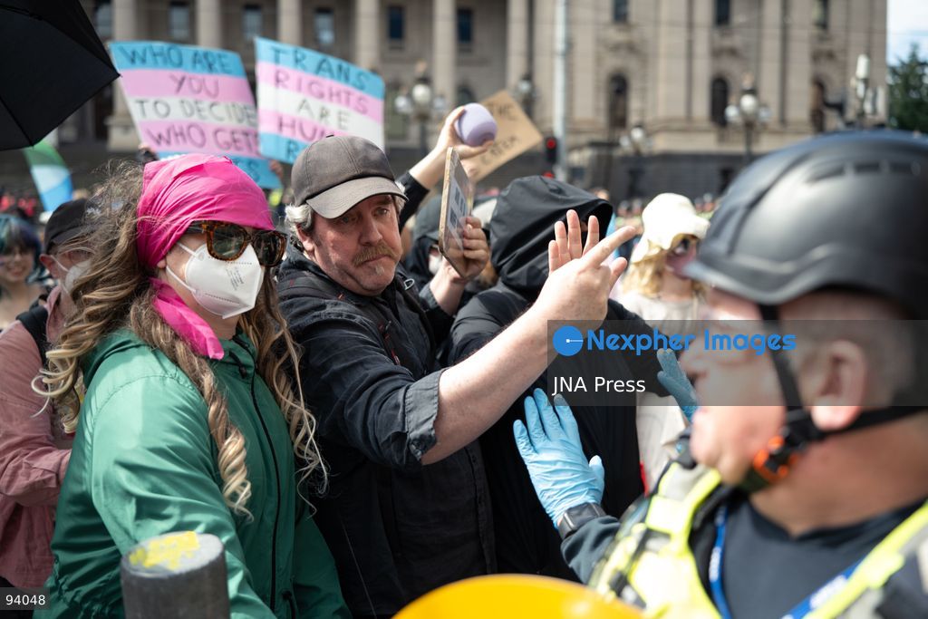 MELBOURNE, AUSTRALIA, SEPTEMBER 19, 2026: Police separate opposing groups during demonstrations outside the Parliament of Victoria in Melbourne, where a group describing itself as a women’s rights movement gathered to oppose legal protections for transgender people and was met by transgender rights counter-protesters. Tensions escalated when Avi Yemini of the right-wing outlet Rebel News approached the counter-protest and became involved in a confrontation with demonstrators before police intervened and separated those involved. Photo by Gwendolyn Dilon / JNA Press. (Photo by Gwendolyn Dillon/JNA Press via Nexpher Images)