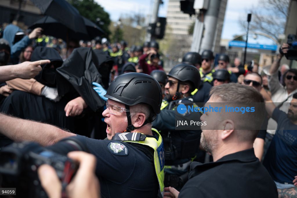 MELBOURNE, AUSTRALIA, SEPTEMBER 19, 2026: Police separate opposing groups during demonstrations outside the Parliament of Victoria in Melbourne, where a group describing itself as a women’s rights movement gathered to oppose legal protections for transgender people and was met by transgender rights counter-protesters. Tensions escalated when Avi Yemini of the right-wing outlet Rebel News approached the counter-protest and became involved in a confrontation with demonstrators before police intervened and separated those involved. Photo by Gwendolyn Dilon / JNA Press. (Photo by Gwendolyn Dillon/JNA Press via Nexpher Images)