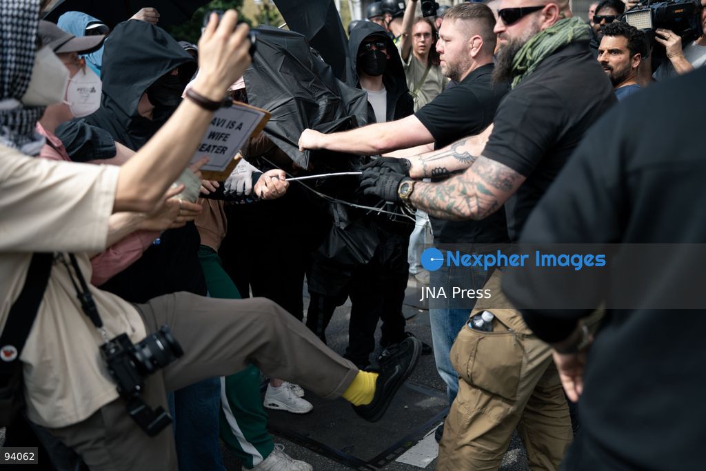 MELBOURNE, AUSTRALIA, SEPTEMBER 19, 2026: Police separate opposing groups during demonstrations outside the Parliament of Victoria in Melbourne, where a group describing itself as a women’s rights movement gathered to oppose legal protections for transgender people and was met by transgender rights counter-protesters. Tensions escalated when Avi Yemini of the right-wing outlet Rebel News approached the counter-protest and became involved in a confrontation with demonstrators before police intervened and separated those involved. Photo by Gwendolyn Dilon / JNA Press. (Photo by Gwendolyn Dillon/JNA Press via Nexpher Images)