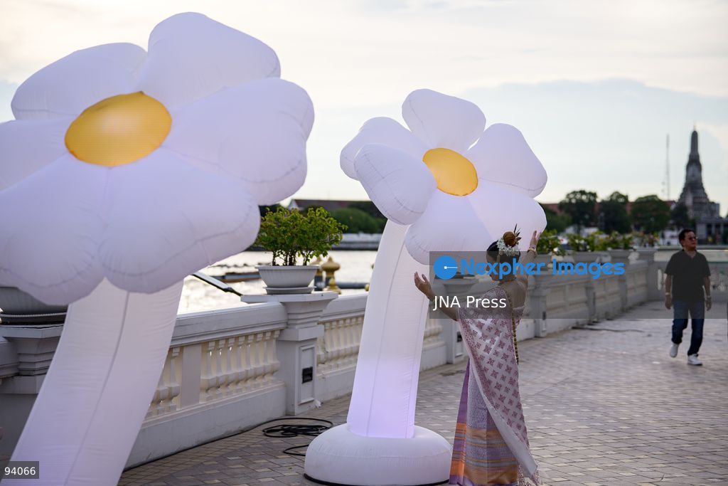 BANGKOK, THAILAND, SEPTEMBER 19, 2026: Visitors attend the Bangkok Flower Festival 2026 at Yodpiman River Walk in the Pak Khlong Talat flower market district along the Chao Phraya River. The inaugural festival, organized by Awakening and Yodpiman River Walk, features floral displays, art exhibitions, workshops, markets and food-related activities. The 10-day event runs from September 18 to 27. Photo by Watsawat Koktabtim / JNA Press. (Photo by Watsawat Koktabtim/JNA Press via Nexpher Images)
