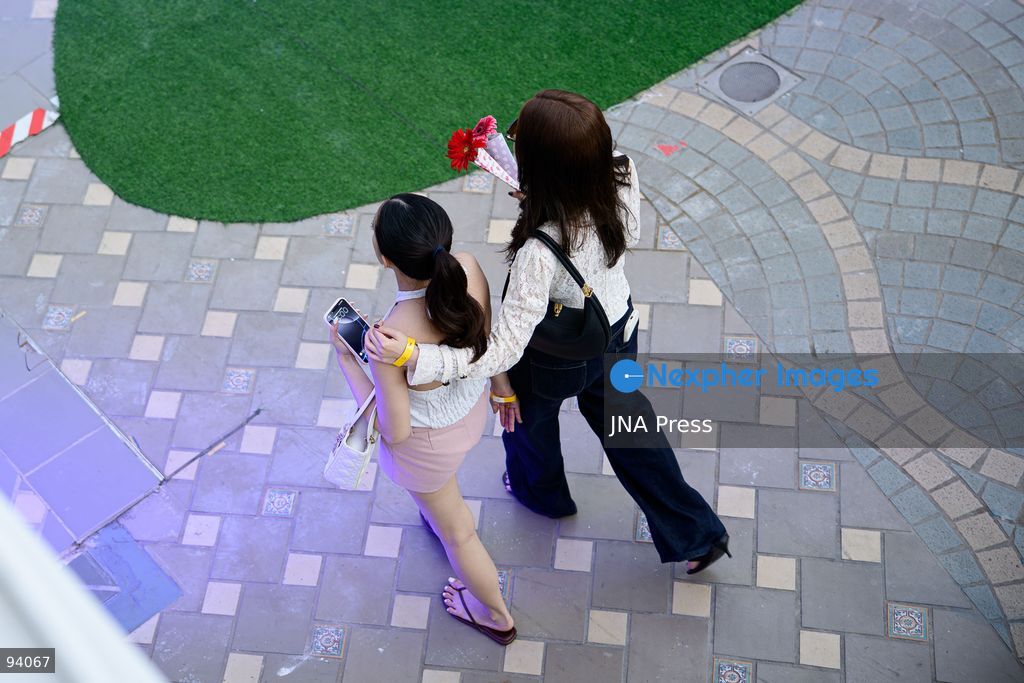 BANGKOK, THAILAND, SEPTEMBER 19, 2026: Visitors attend the Bangkok Flower Festival 2026 at Yodpiman River Walk in the Pak Khlong Talat flower market district along the Chao Phraya River. The inaugural festival, organized by Awakening and Yodpiman River Walk, features floral displays, art exhibitions, workshops, markets and food-related activities. The 10-day event runs from September 18 to 27. Photo by Watsawat Koktabtim / JNA Press. (Photo by Watsawat Koktabtim/JNA Press via Nexpher Images)