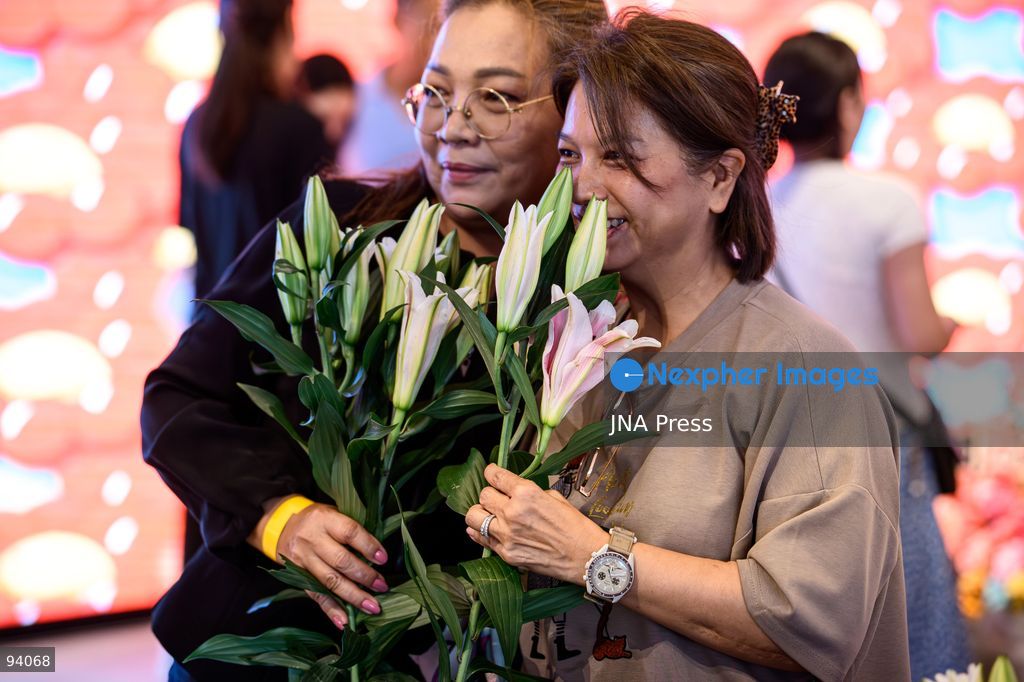 BANGKOK, THAILAND, SEPTEMBER 19, 2026: Visitors attend the Bangkok Flower Festival 2026 at Yodpiman River Walk in the Pak Khlong Talat flower market district along the Chao Phraya River. The inaugural festival, organized by Awakening and Yodpiman River Walk, features floral displays, art exhibitions, workshops, markets and food-related activities. The 10-day event runs from September 18 to 27. Photo by Watsawat Koktabtim / JNA Press. (Photo by Watsawat Koktabtim/JNA Press via Nexpher Images)