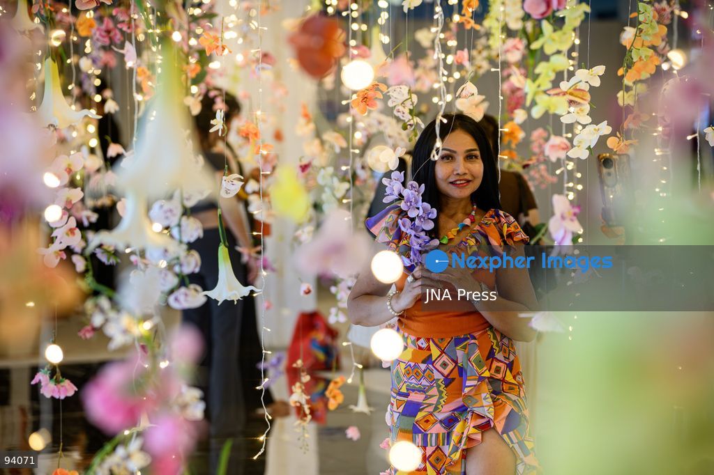 BANGKOK, THAILAND, SEPTEMBER 19, 2026: Visitors attend the Bangkok Flower Festival 2026 at Yodpiman River Walk in the Pak Khlong Talat flower market district along the Chao Phraya River. The inaugural festival, organized by Awakening and Yodpiman River Walk, features floral displays, art exhibitions, workshops, markets and food-related activities. The 10-day event runs from September 18 to 27. Photo by Watsawat Koktabtim / JNA Press. (Photo by Watsawat Koktabtim/JNA Press via Nexpher Images)