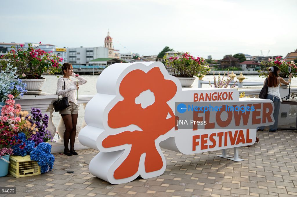 BANGKOK, THAILAND, SEPTEMBER 19, 2026: Visitors attend the Bangkok Flower Festival 2026 at Yodpiman River Walk in the Pak Khlong Talat flower market district along the Chao Phraya River. The inaugural festival, organized by Awakening and Yodpiman River Walk, features floral displays, art exhibitions, workshops, markets and food-related activities. The 10-day event runs from September 18 to 27. Photo by Watsawat Koktabtim / JNA Press. (Photo by Watsawat Koktabtim/JNA Press via Nexpher Images)