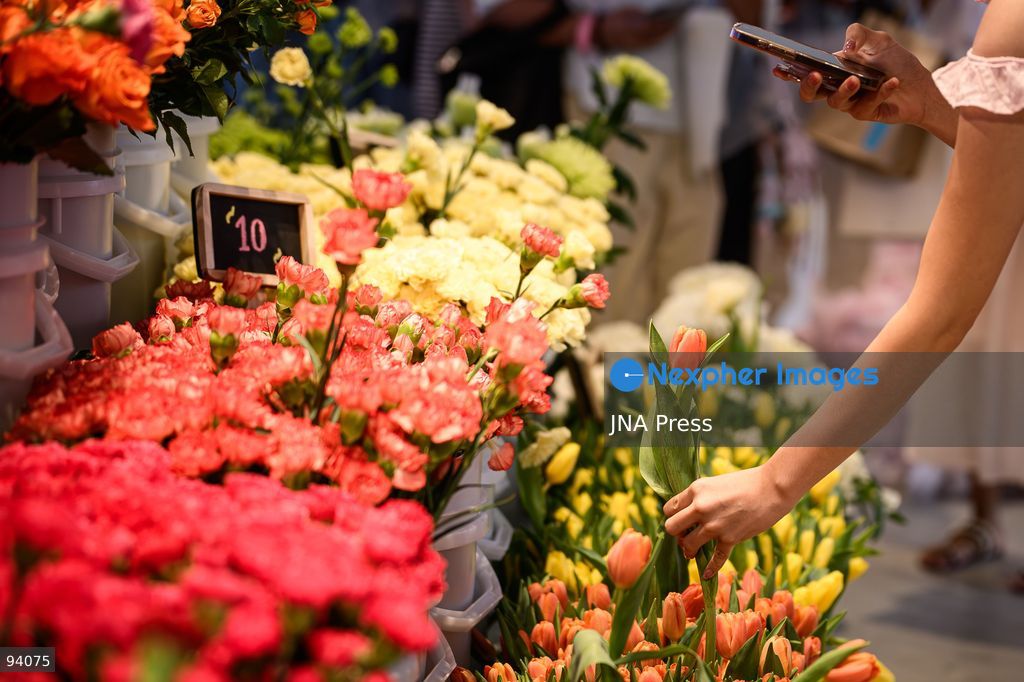 BANGKOK, THAILAND, SEPTEMBER 19, 2026: Visitors attend the Bangkok Flower Festival 2026 at Yodpiman River Walk in the Pak Khlong Talat flower market district along the Chao Phraya River. The inaugural festival, organized by Awakening and Yodpiman River Walk, features floral displays, art exhibitions, workshops, markets and food-related activities. The 10-day event runs from September 18 to 27. Photo by Watsawat Koktabtim / JNA Press. (Photo by Watsawat Koktabtim/JNA Press via Nexpher Images)