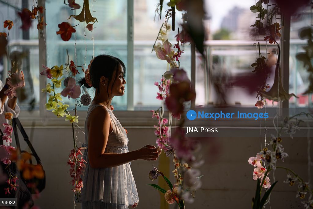 BANGKOK, THAILAND, SEPTEMBER 19, 2026: Visitors attend the Bangkok Flower Festival 2026 at Yodpiman River Walk in the Pak Khlong Talat flower market district along the Chao Phraya River. The inaugural festival, organized by Awakening and Yodpiman River Walk, features floral displays, art exhibitions, workshops, markets and food-related activities. The 10-day event runs from September 18 to 27. Photo by Watsawat Koktabtim / JNA Press. (Photo by Watsawat Koktabtim/JNA Press via Nexpher Images)