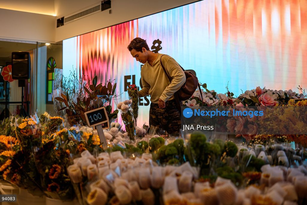 BANGKOK, THAILAND, SEPTEMBER 19, 2026: Visitors attend the Bangkok Flower Festival 2026 at Yodpiman River Walk in the Pak Khlong Talat flower market district along the Chao Phraya River. The inaugural festival, organized by Awakening and Yodpiman River Walk, features floral displays, art exhibitions, workshops, markets and food-related activities. The 10-day event runs from September 18 to 27. Photo by Watsawat Koktabtim / JNA Press. (Photo by Watsawat Koktabtim/JNA Press via Nexpher Images)