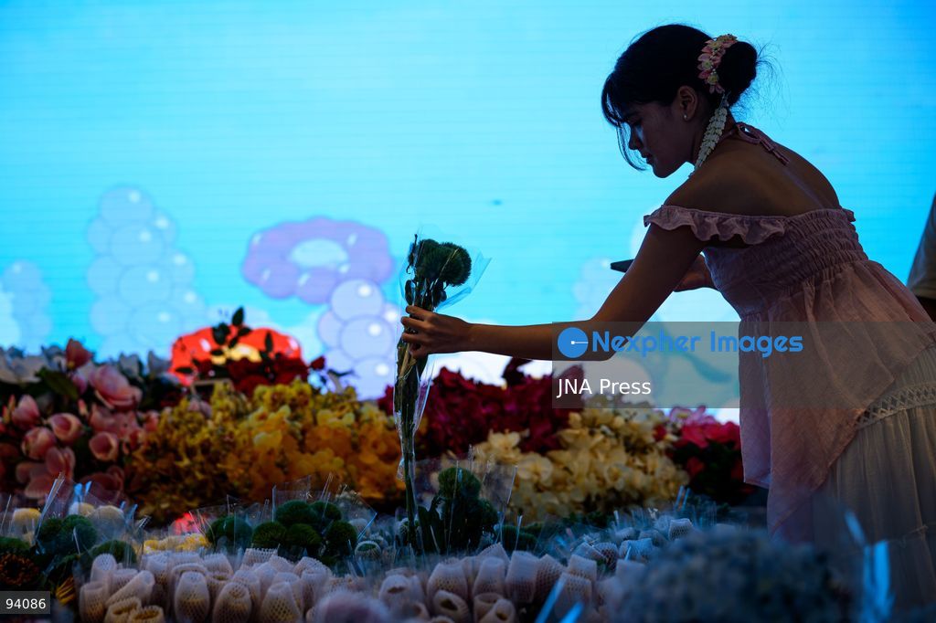 BANGKOK, THAILAND, SEPTEMBER 19, 2026: Visitors attend the Bangkok Flower Festival 2026 at Yodpiman River Walk in the Pak Khlong Talat flower market district along the Chao Phraya River. The inaugural festival, organized by Awakening and Yodpiman River Walk, features floral displays, art exhibitions, workshops, markets and food-related activities. The 10-day event runs from September 18 to 27. Photo by Watsawat Koktabtim / JNA Press. (Photo by Watsawat Koktabtim/JNA Press via Nexpher Images)
