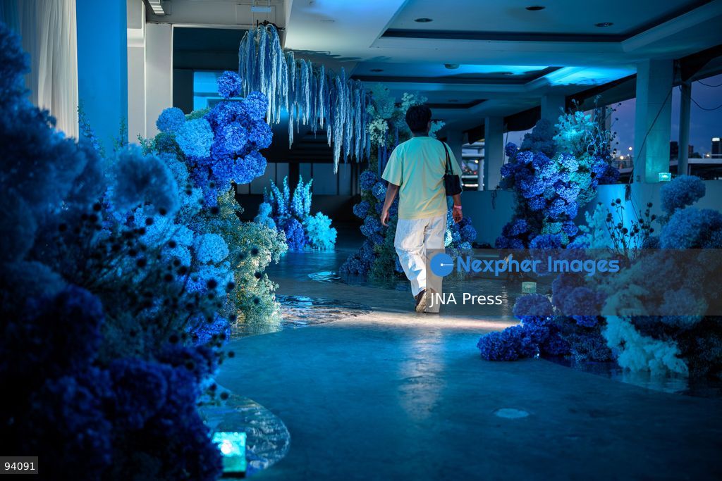 BANGKOK, THAILAND, SEPTEMBER 19, 2026: Visitors attend the Bangkok Flower Festival 2026 at Yodpiman River Walk in the Pak Khlong Talat flower market district along the Chao Phraya River. The inaugural festival, organized by Awakening and Yodpiman River Walk, features floral displays, art exhibitions, workshops, markets and food-related activities. The 10-day event runs from September 18 to 27. Photo by Watsawat Koktabtim / JNA Press. (Photo by Watsawat Koktabtim/JNA Press via Nexpher Images)