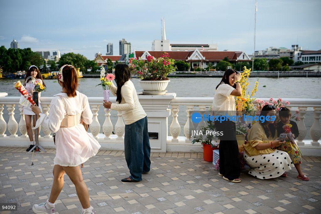 BANGKOK, THAILAND, SEPTEMBER 19, 2026: Visitors attend the Bangkok Flower Festival 2026 at Yodpiman River Walk in the Pak Khlong Talat flower market district along the Chao Phraya River. The inaugural festival, organized by Awakening and Yodpiman River Walk, features floral displays, art exhibitions, workshops, markets and food-related activities. The 10-day event runs from September 18 to 27. Photo by Watsawat Koktabtim / JNA Press. (Photo by Watsawat Koktabtim/JNA Press via Nexpher Images)