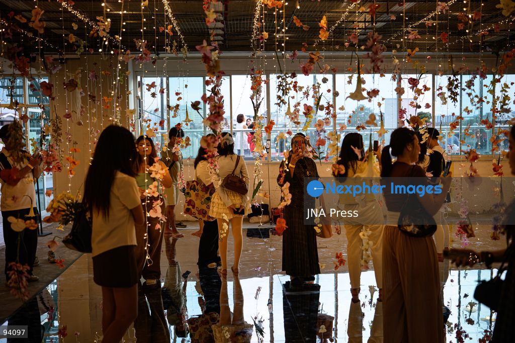 BANGKOK, THAILAND, SEPTEMBER 19, 2026: Visitors attend the Bangkok Flower Festival 2026 at Yodpiman River Walk in the Pak Khlong Talat flower market district along the Chao Phraya River. The inaugural festival, organized by Awakening and Yodpiman River Walk, features floral displays, art exhibitions, workshops, markets and food-related activities. The 10-day event runs from September 18 to 27. Photo by Watsawat Koktabtim / JNA Press. (Photo by Watsawat Koktabtim/JNA Press via Nexpher Images)