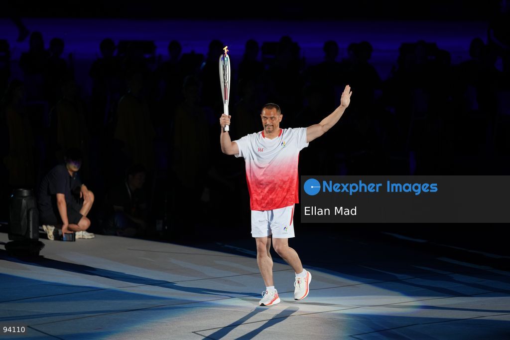 Koji Murofushi, Japanese former hammer thrower carrying the torch at the 2026 Asian Games opening ceremony on September 19, 2026 in Nagoya, Japan (Photo by Ellan Mad/Nexpher Images)