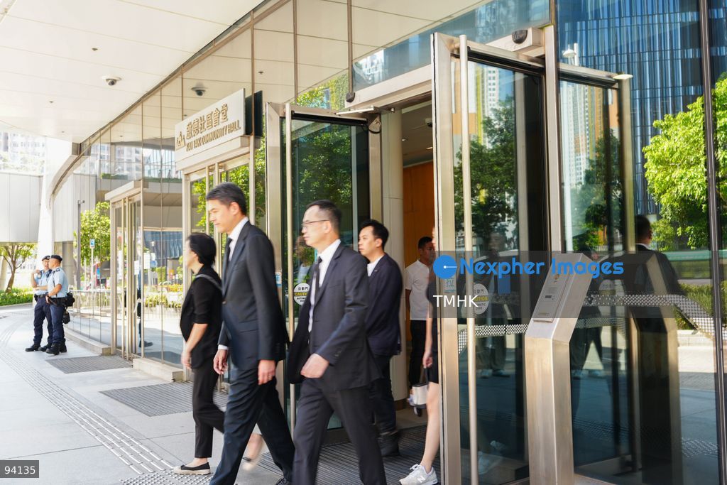 Mourner leaves the Kai Tak Community Hall after signing the condolence book and paying respects to former Chief Executive Tung Chee-hwa on September 19, 2026 in Hong Kong. (Photo by Zulu Lo/TMHK via Nexpher Images)