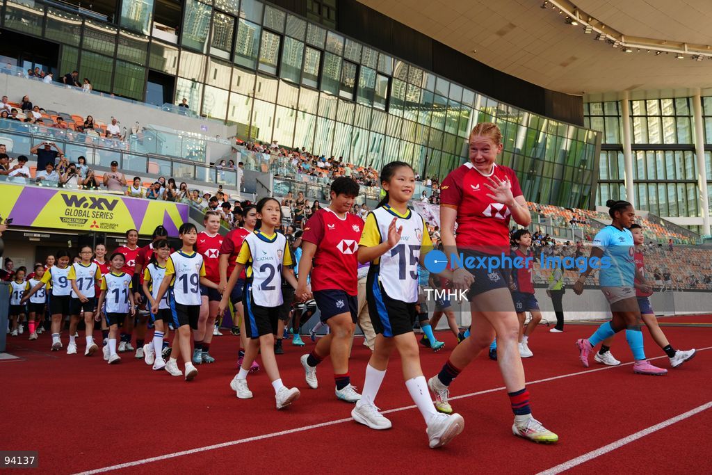 Players of Hong Kong, China and Fiji walk onto the pitch ahead of their Round 2 fixture in the 2026 WXV Global Series at Kai Tak Youth Sports Ground on September 19, 2026 in Hong Kong. (Photo by Zulu Lo/TMHK via Nexpher Images)