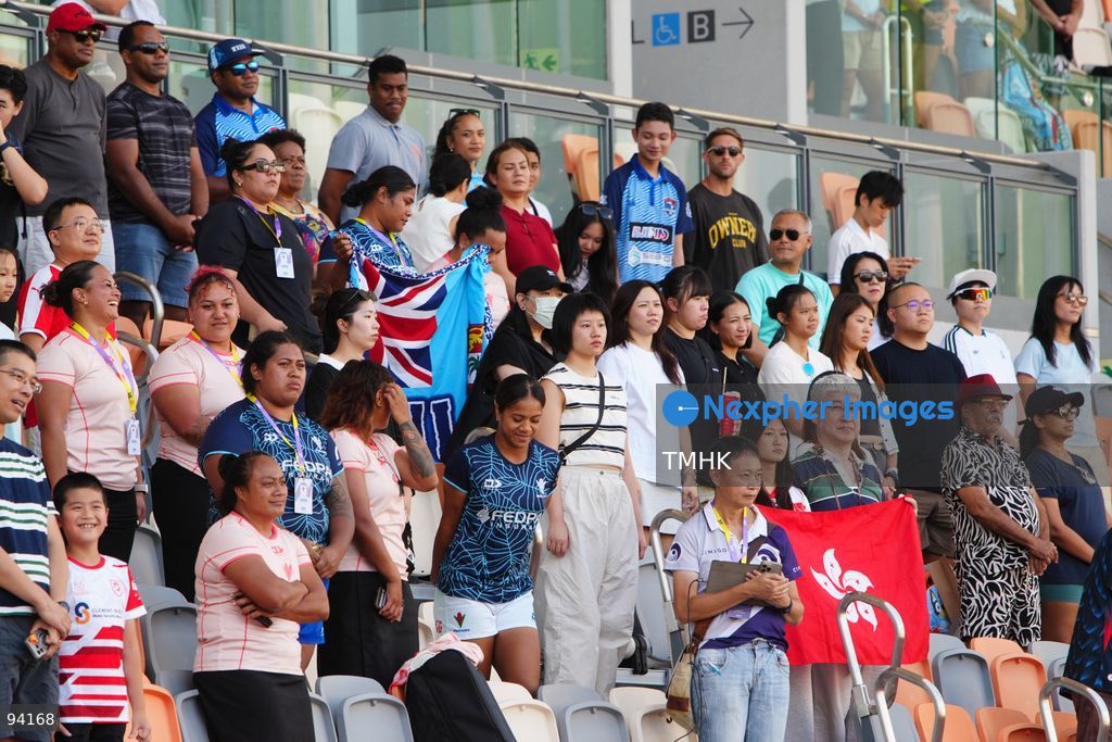 Supporters cheer and wave flags from the stands during the 2026 WXV Global Series match between Hong Kong, China and Fiji at Kai Tak Youth Sports Ground on September 19, 2026 in Hong Kong. (Photo by Zulu Lo/TMHK via Nexpher Images)