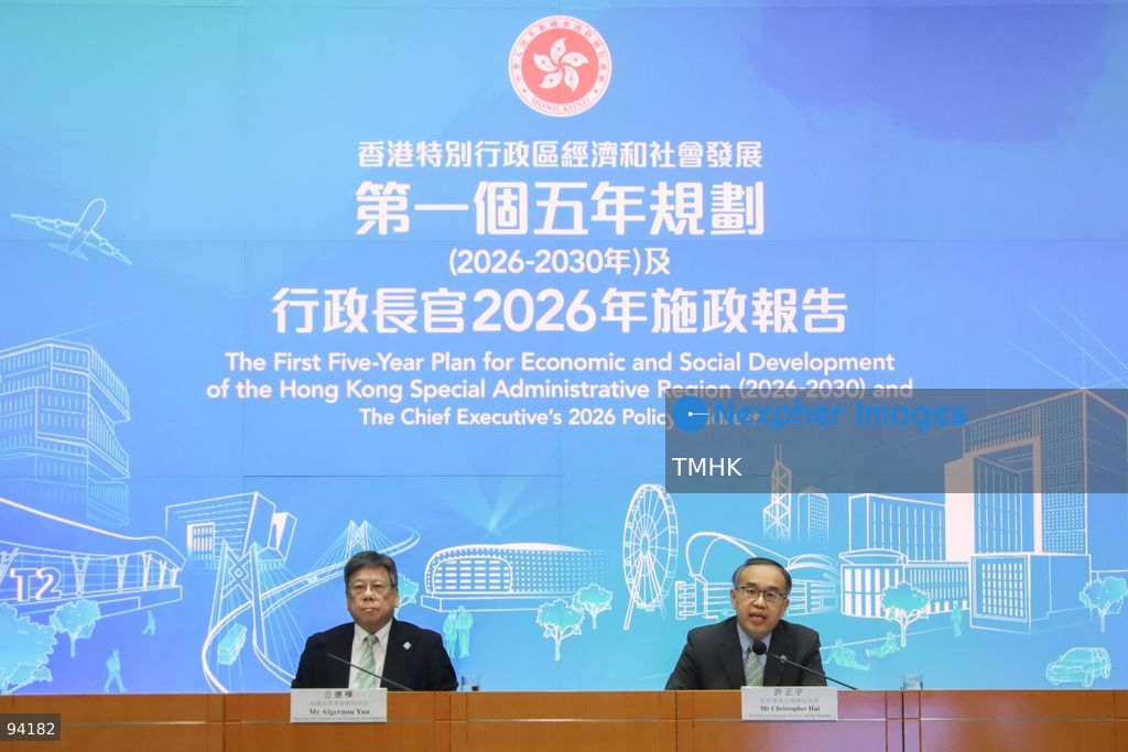 Secretary for Financial Services and the Treasury Christopher Hui Ching-yu and Secretary for Commerce and Economic Development Algernon Yau Ying-wah pose for a photo call before a press conference detailing initiatives on Hong Kong's role as an international financial and trade center in the 2026 Policy Address and the "First Five-Year Plan of Hong Kong" on September 18, 2026 in Hong Kong. (Photo by Gordon Choi/TMHK via Nexpher Images)