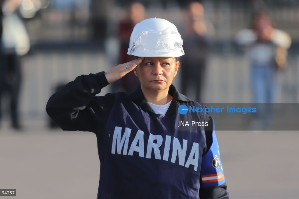 MEXICO CITY, MEXICO, SEPTEMBER 19, 2026: Mexican President Claudia Sheinbaum presides over a ceremony at the Zócalo in Mexico City as the national flag is raised to half-staff in memory of the victims of the September 19 earthquakes of 1985 and 2017. The ceremony included military honors and a moment of silence for those killed in the disasters. Photo by Carlos Santiago / JNA Press. (Photo by Carlos Santiago/JNA Press via Nexpher Images)