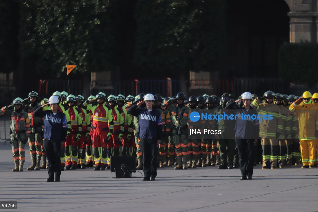MEXICO CITY, MEXICO, SEPTEMBER 19, 2026: Mexican President Claudia Sheinbaum presides over a ceremony at the Zócalo in Mexico City as the national flag is raised to half-staff in memory of the victims of the September 19 earthquakes of 1985 and 2017. The ceremony included military honors and a moment of silence for those killed in the disasters. Photo by Carlos Santiago / JNA Press. (Photo by Carlos Santiago/JNA Press via Nexpher Images)
