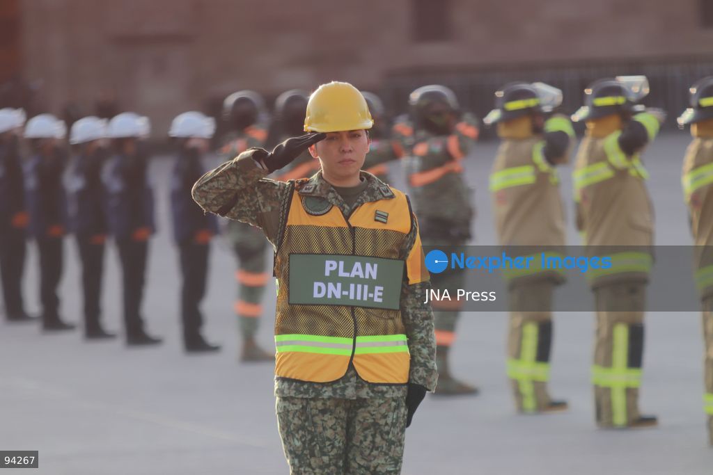 MEXICO CITY, MEXICO, SEPTEMBER 19, 2026: Mexican President Claudia Sheinbaum presides over a ceremony at the Zócalo in Mexico City as the national flag is raised to half-staff in memory of the victims of the September 19 earthquakes of 1985 and 2017. The ceremony included military honors and a moment of silence for those killed in the disasters. Photo by Carlos Santiago / JNA Press. (Photo by Carlos Santiago/JNA Press via Nexpher Images)