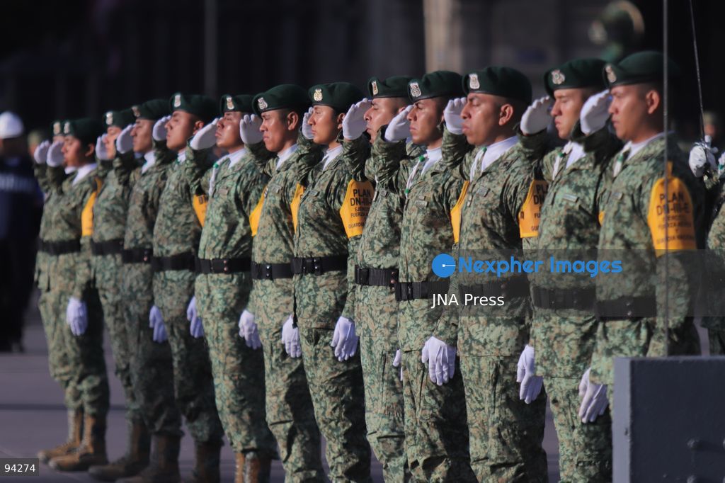 MEXICO CITY, MEXICO, SEPTEMBER 19, 2026: Mexican President Claudia Sheinbaum presides over a ceremony at the Zócalo in Mexico City as the national flag is raised to half-staff in memory of the victims of the September 19 earthquakes of 1985 and 2017. The ceremony included military honors and a moment of silence for those killed in the disasters. Photo by Carlos Santiago / JNA Press. (Photo by Carlos Santiago/JNA Press via Nexpher Images)