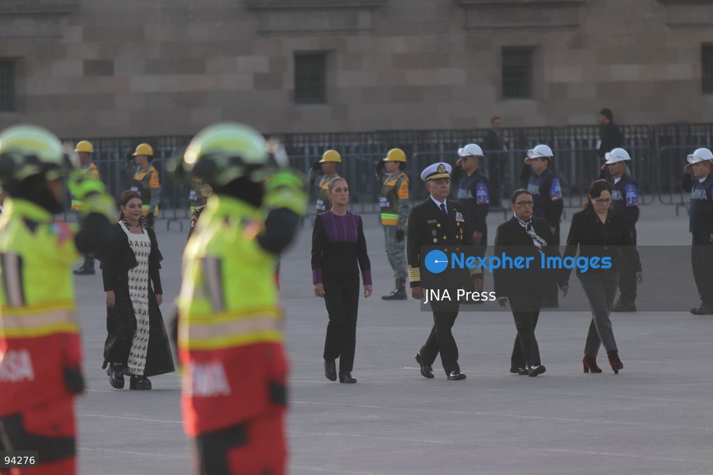 MEXICO CITY, MEXICO, SEPTEMBER 19, 2026: Mexican President Claudia Sheinbaum presides over a ceremony at the Zócalo in Mexico City as the national flag is raised to half-staff in memory of the victims of the September 19 earthquakes of 1985 and 2017. The ceremony included military honors and a moment of silence for those killed in the disasters. Photo by Carlos Santiago / JNA Press. (Photo by Carlos Santiago/JNA Press via Nexpher Images)