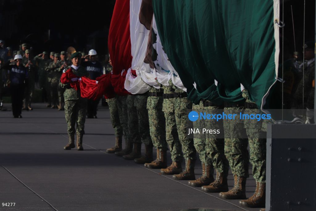 MEXICO CITY, MEXICO, SEPTEMBER 19, 2026: Mexican President Claudia Sheinbaum presides over a ceremony at the Zócalo in Mexico City as the national flag is raised to half-staff in memory of the victims of the September 19 earthquakes of 1985 and 2017. The ceremony included military honors and a moment of silence for those killed in the disasters. Photo by Carlos Santiago / JNA Press. (Photo by Carlos Santiago/JNA Press via Nexpher Images)