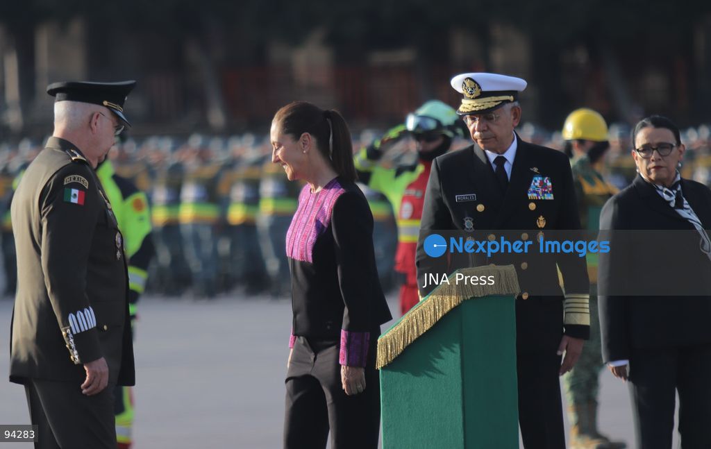 MEXICO CITY, MEXICO, SEPTEMBER 19, 2026: Mexican President Claudia Sheinbaum presides over a ceremony at the Zócalo in Mexico City as the national flag is raised to half-staff in memory of the victims of the September 19 earthquakes of 1985 and 2017. The ceremony included military honors and a moment of silence for those killed in the disasters. Photo by Carlos Santiago / JNA Press. (Photo by Carlos Santiago/JNA Press via Nexpher Images)