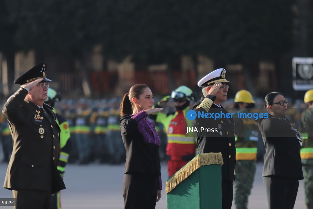MEXICO CITY, MEXICO, SEPTEMBER 19, 2026: Mexican President Claudia Sheinbaum presides over a ceremony at the Zócalo in Mexico City as the national flag is raised to half-staff in memory of the victims of the September 19 earthquakes of 1985 and 2017. The ceremony included military honors and a moment of silence for those killed in the disasters. Photo by Carlos Santiago / JNA Press. (Photo by Carlos Santiago/JNA Press via Nexpher Images)