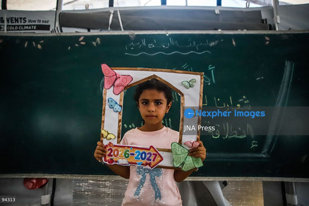 GAZA CITY, GAZA STRIP, SEPTEMBER 19, 2026: Palestinian students arrive at Al-Itqan School, operating from tents in the Al-Saftawi neighborhood of northern Gaza City, as the new academic year begins across the Gaza Strip. Education is resuming through schools and temporary learning spaces amid widespread damage to educational infrastructure and years of disruption caused by the war. Photo by Ramez Habboub / JNA Press. (Photo by Ramez Habboub/JNA Press via Nexpher Images)