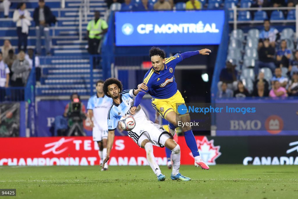 Rayan Elloumi #19 of Vancouver Whitecaps FC and Jalen Neal #2 of CF Montreal battle for the ball during semi-final match of the Canadian Championship between CF Montreal and Vancouver Whitecaps FC at Saputo Stadium. on September 16, 2026 in Montreal, Canada. (Photo by Horacio Zamora/ Eyepix Group) (Photo by Horacio Zamora/ Eyepix Group/Eyepix via Nexpher Images)