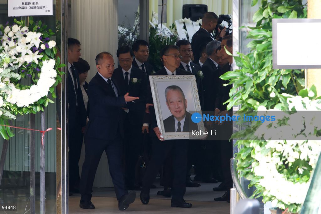 A portrait bearer holding the funeral portrait of Tung Chee-hwa at the Hong Kong Funeral Home in North Point on September 20, 2026 in Hong Kong. Today, the funeral ceremony for Hong Kong's first Chief Executive, Tung Chee-hwa at the Hong Kong Funeral Home in North Point. (Photo by Kobe Li/Nexpher Images)