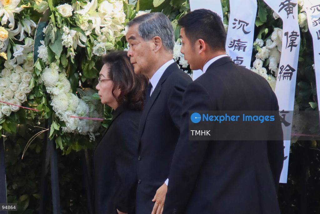 Vice Chairman of the National Committee of the CPPCC and former Chief Executive Leung Chun-ying arrives with his wife, Regina Leung Tong Ching-yee, at the Hong Kong Funeral Home to pay respects during the wake for Tung Chee-hwa on September 19, 2026 in Hong Kong. (Photo by Gordon Choi/TMHK via Nexpher Images)