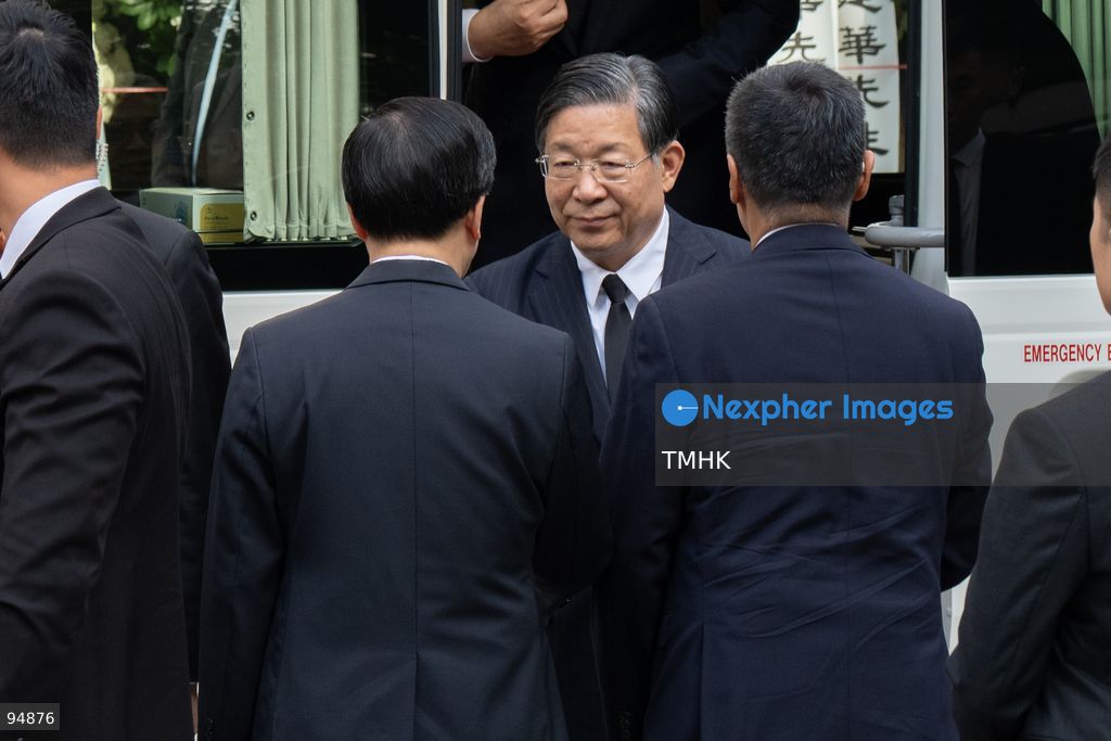 Vice Chairman and Secretary-General of the National Committee of the CPPCC Wang Dongfeng shakes hands with Chief Executive John Lee Ka-chiu upon arriving at the Hong Kong Funeral Home for the funeral of Tung Chee-hwa on September 20, 2026 in Hong Kong. (Photo by Kevin Li/TMHK via Nexpher Images)