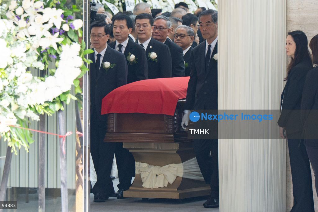 Vice Chairman of the National Committee of the CPPCC Leung Chun-ying, Chief Executive John Lee Ka-chiu, Deputy Director of the Liaison Office Xu Qifang, Director of the National Government Offices Administration Wang Yonghong, and Chief Justice Andrew Cheung Kui-nung serve as pallbearers escorting the casket of former Chief Executive Tung Chee-hwa during his state-level funeral service at the Hong Kong Funeral Home on September 20, 2026 in Hong Kong. (Photo by Kevin Li/TMHK via Nexpher Images)