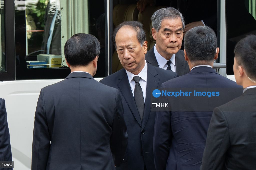 Chief Executive John Lee Ka-chiu greets and shakes hands with Vice Chairman of the National Committee of the CPPCC and Head of the Organization Department of the CPC Central Committee Shi Taifeng as he arrives alongside former Chief Executive Leung Chun-ying at the Hong Kong Funeral Home for the funeral of Tung Chee-hwa on September 20, 2026 in Hong Kong. (Photo by Kevin Li/TMHK via Nexpher Images)