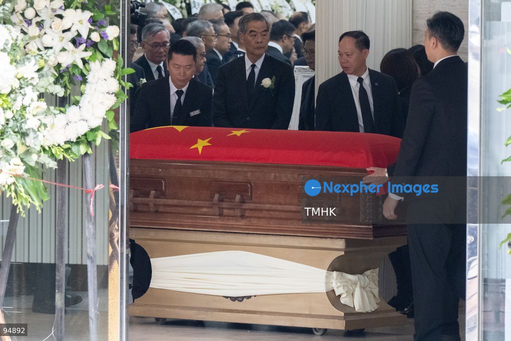 The casket of former Chief Executive Tung Chee-hwa, draped in the national flag of the People's Republic of China, is moved from the funeral hall to the hearse outside the Hong Kong Funeral Home on September 20, 2026 in Hong Kong. (Photo by Kevin Li/TMHK via Nexpher Images)
