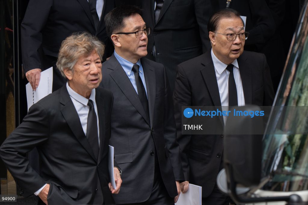 Former NPC Standing Committee member Tam Yiu-chung; Secretary for Innovation, Technology and Industry Professor Sun Dong; and Executive Council member Ronny Tong Ka-wah leave the Hong Kong Funeral Home together after attending the funeral of former Chief Executive Tung Chee-hwa on September 20, 2026 in Hong Kong. (Photo by Kevin Li/TMHK via Nexpher Images)