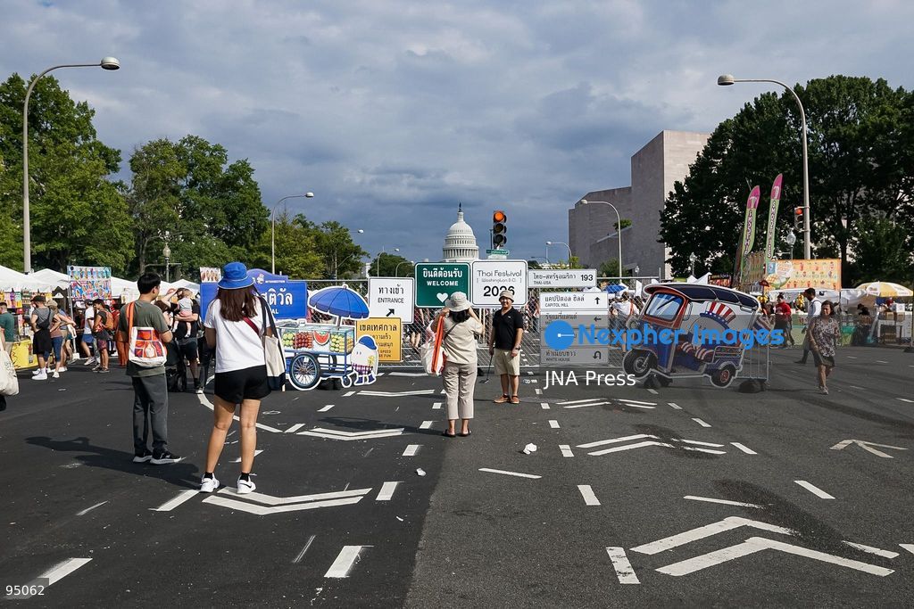 WASHINGTON, D.C., UNITED STATES, SEPTEMBER 19, 2026: Visitors queue to purchase traditional Thai food during the Sawasdee DC Thai Festival on Pennsylvania Avenue in Washington. The annual cultural festival showcases Thai cuisine, traditional and contemporary music, dance, Muay Thai, arts and other cultural activities while promoting Thai businesses and cultural exchange in the United States. Photo by Ariel Peña / JNA Press. (Photo by Ariel Peña/JNA Press via Nexpher Images)