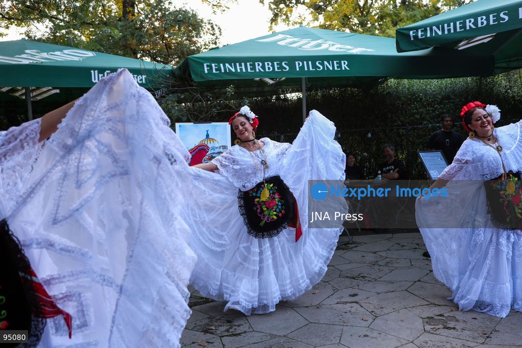 LEIPZIG, GERMANY, SEPTEMBER 19, 2026: Members of Leipzig’s Mexican community and visitors celebrate Mexico’s Independence Day at the Musikpavillon in Clara-Zetkin-Park. The cultural celebration featured live music, mariachi performances, traditional Mexican regional dances, food and activities for children, including piñata-making. Photo by Maria Castro / JNA Press. (Photo by Maria Castro/JNA Press via Nexpher Images)