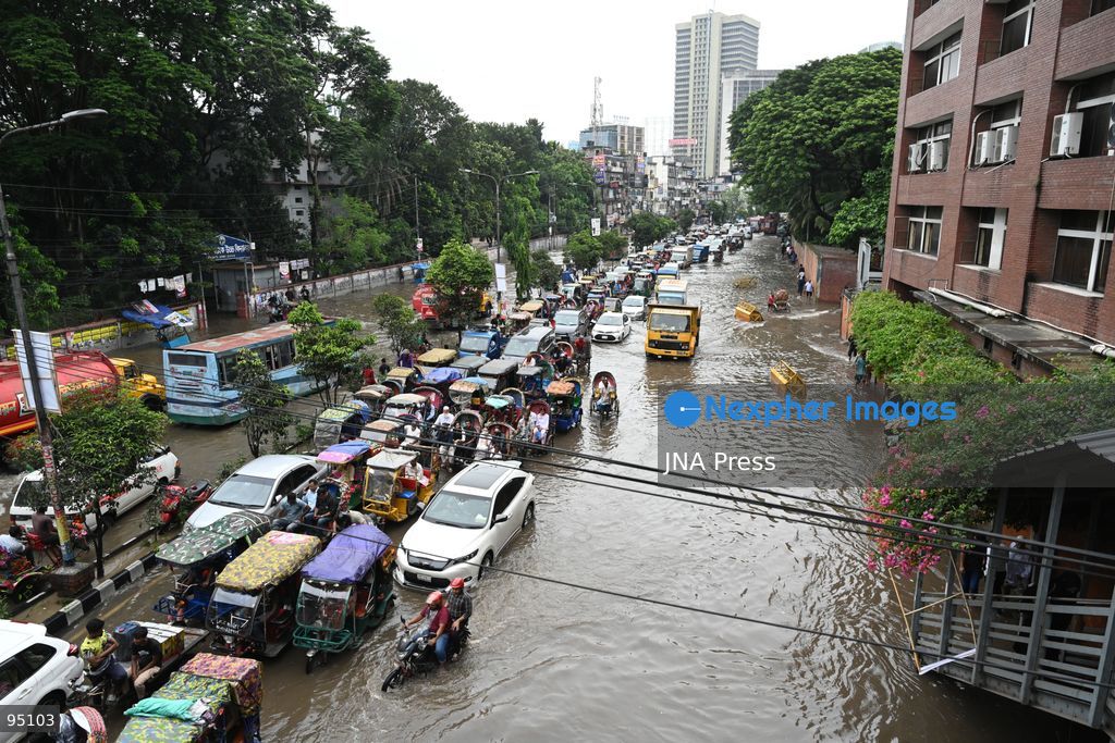 DHAKA, BANGLADESH, SEPTEMBER 20, 2026: Vehicles and passengers navigate waterlogged streets in Dhaka following heavy rainfall in the Bangladeshi capital. Floodwater submerged sections of roads across the city, disrupting traffic and making travel difficult for residents and commuters. Photo by Mamunur Rashid/ JNA Press. (Photo by Mamunur Rashid/JNA Press via Nexpher Images)