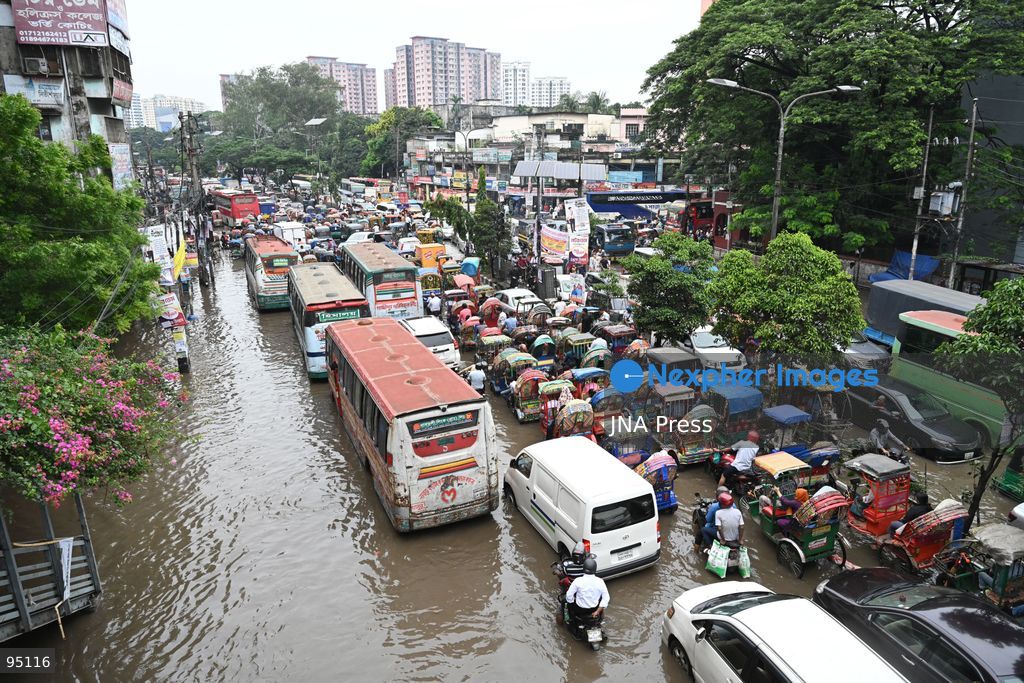 DHAKA, BANGLADESH, SEPTEMBER 20, 2026: Vehicles and passengers navigate waterlogged streets in Dhaka following heavy rainfall in the Bangladeshi capital. Floodwater submerged sections of roads across the city, disrupting traffic and making travel difficult for residents and commuters. Photo by Mamunur Rashid/ JNA Press. (Photo by Mamunur Rashid/JNA Press via Nexpher Images)