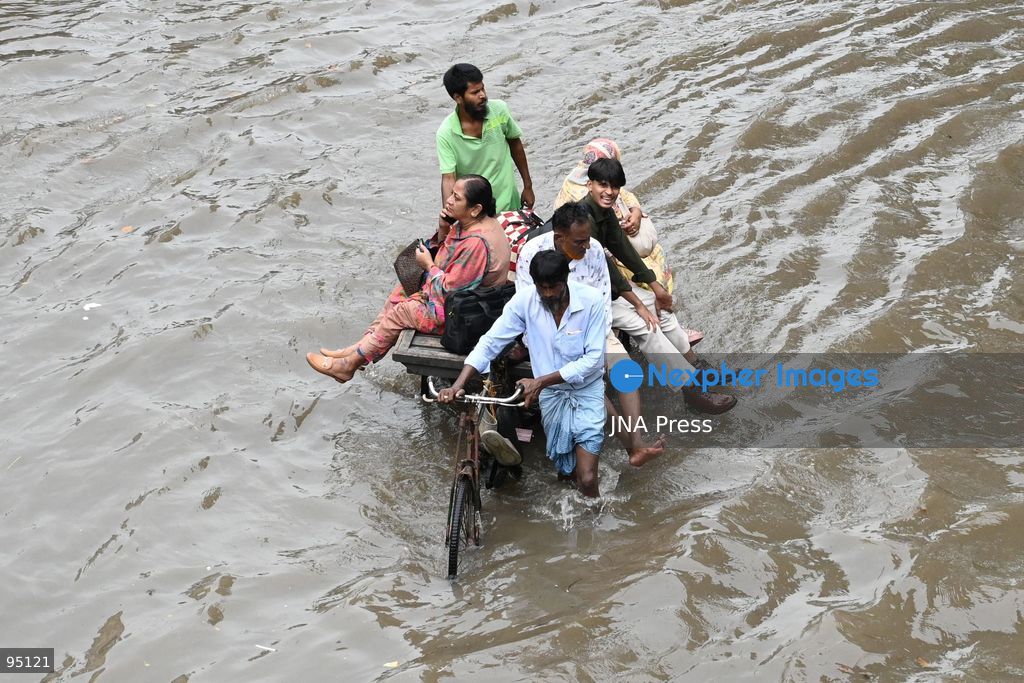 DHAKA, BANGLADESH, SEPTEMBER 20, 2026: Vehicles and passengers navigate waterlogged streets in Dhaka following heavy rainfall in the Bangladeshi capital. Floodwater submerged sections of roads across the city, disrupting traffic and making travel difficult for residents and commuters. Photo by Mamunur Rashid/ JNA Press. (Photo by Mamunur Rashid/JNA Press via Nexpher Images)