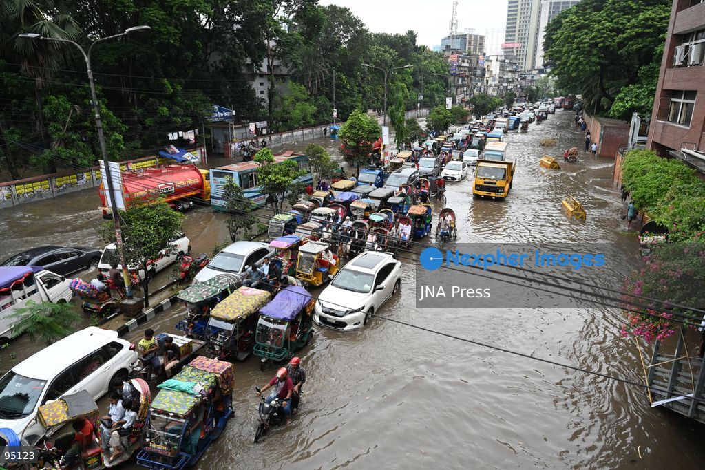 DHAKA, BANGLADESH, SEPTEMBER 20, 2026: Vehicles and passengers navigate waterlogged streets in Dhaka following heavy rainfall in the Bangladeshi capital. Floodwater submerged sections of roads across the city, disrupting traffic and making travel difficult for residents and commuters. Photo by Mamunur Rashid/ JNA Press. (Photo by Mamunur Rashid/JNA Press via Nexpher Images)
