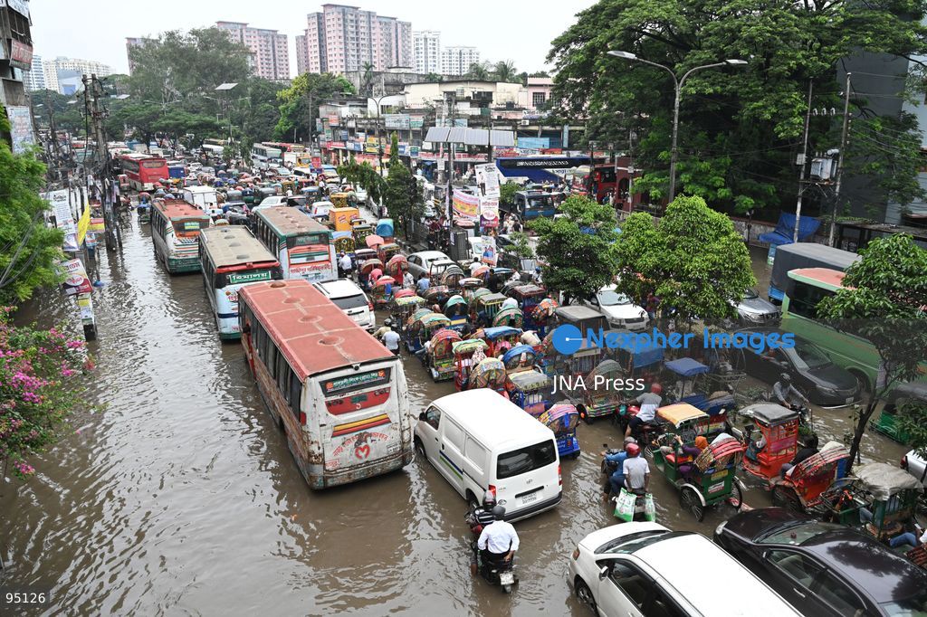 DHAKA, BANGLADESH, SEPTEMBER 20, 2026: Vehicles and passengers navigate waterlogged streets in Dhaka following heavy rainfall in the Bangladeshi capital. Floodwater submerged sections of roads across the city, disrupting traffic and making travel difficult for residents and commuters. Photo by Mamunur Rashid/ JNA Press. (Photo by Mamunur Rashid/JNA Press via Nexpher Images)